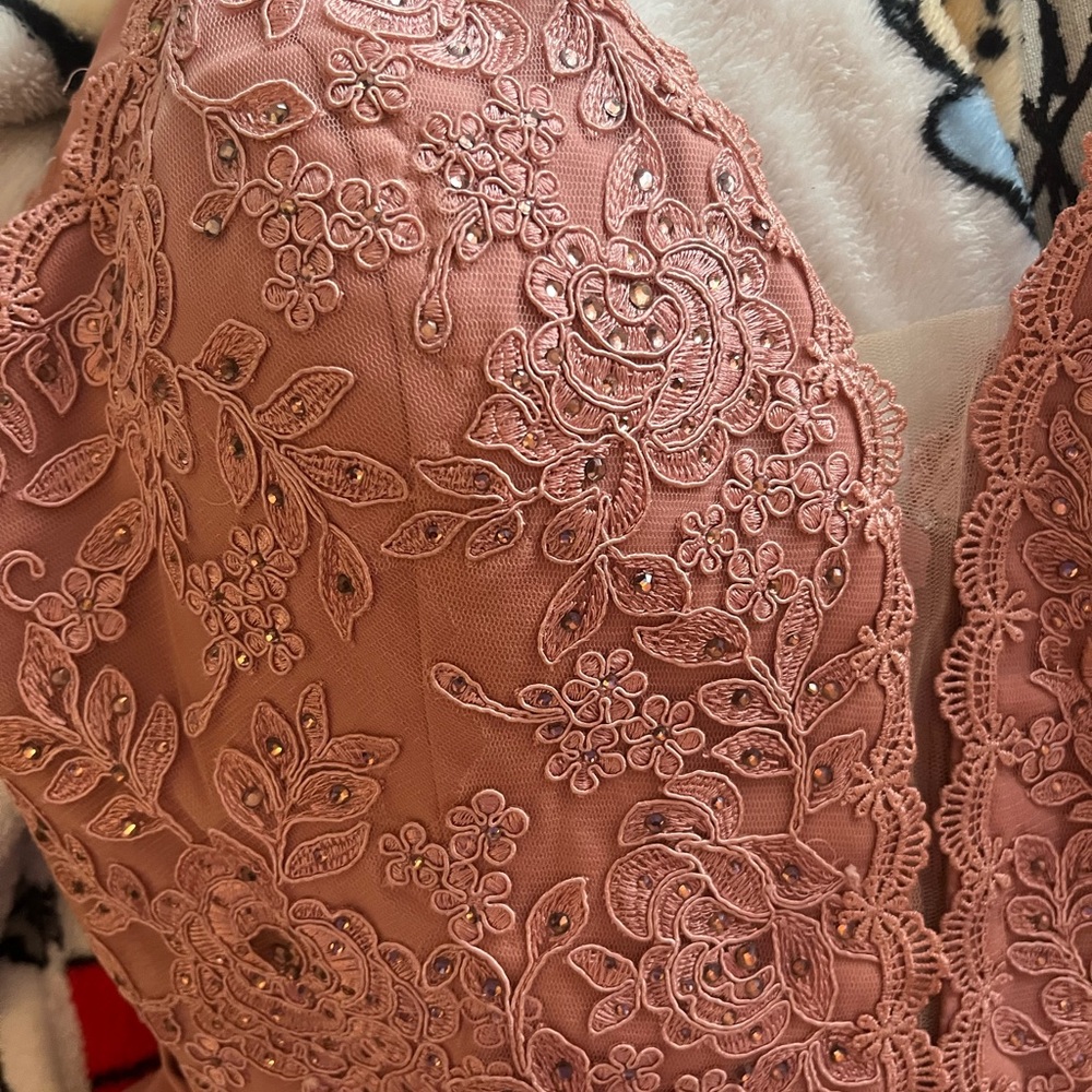 Very cute special occasion dress. Worn once. Purchased from local bridal shop.